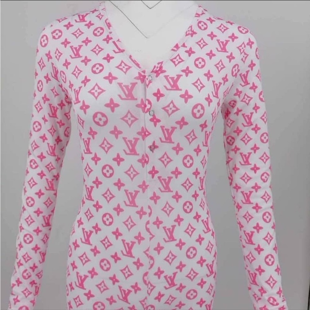 Pink and white designer onesie.